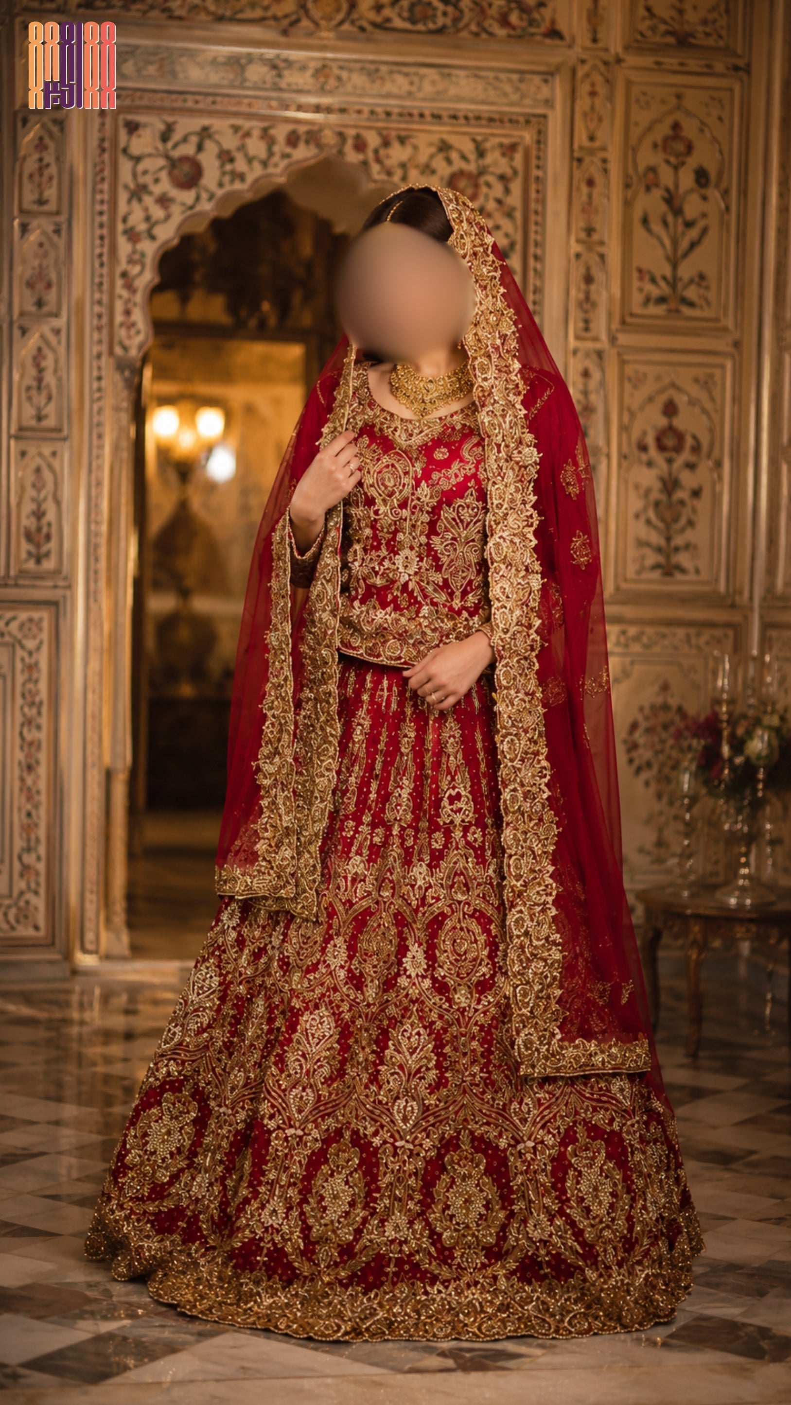 Woman in a traditional red and gold bridal outfit in an ornate room. bridal lehenga pakistani deep anari red full view