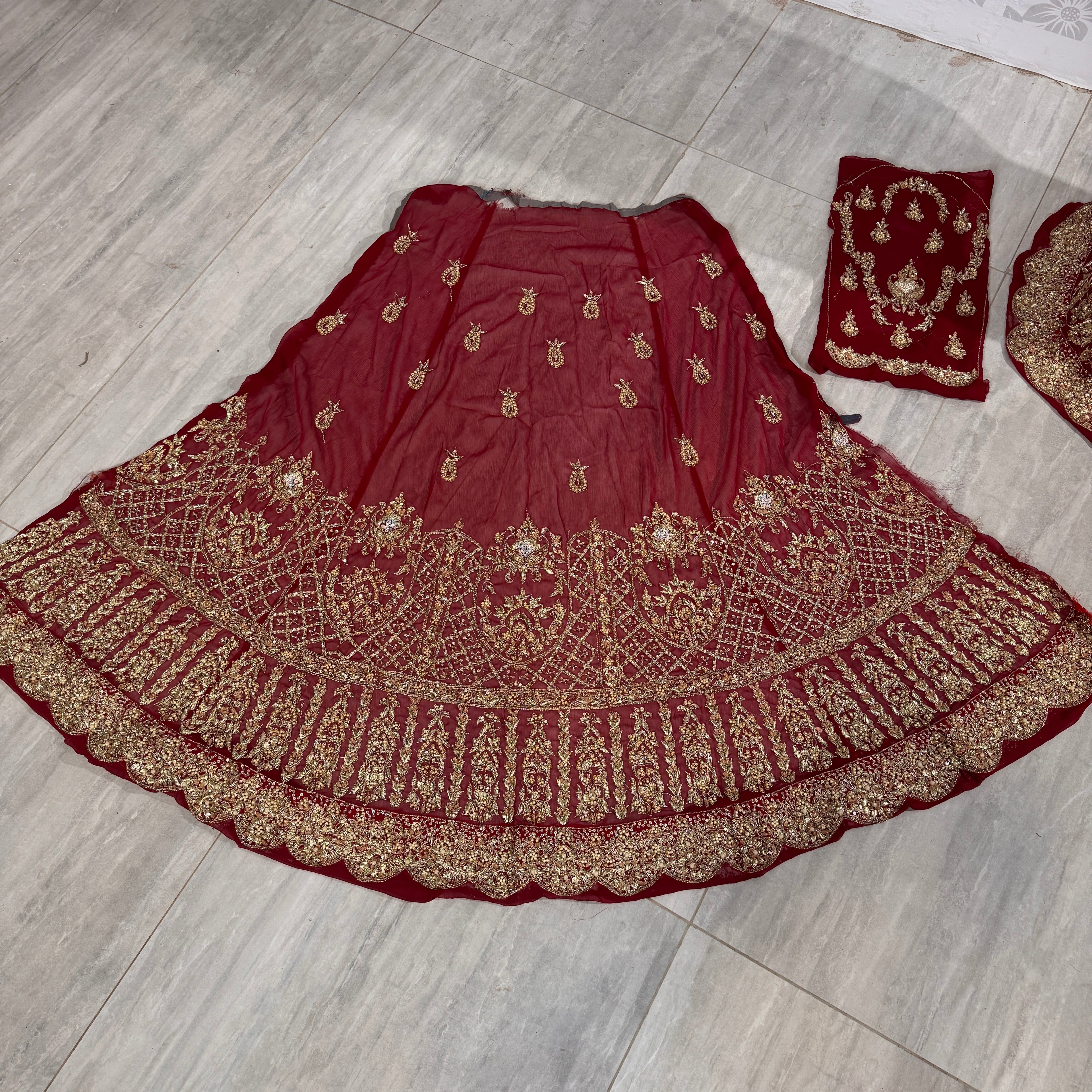 Bridal lehenga hand work BL028 lehenga back view – deep anari red crinkle chiffon with kora dabka and jewelry crystal back embroidery Pakistan
