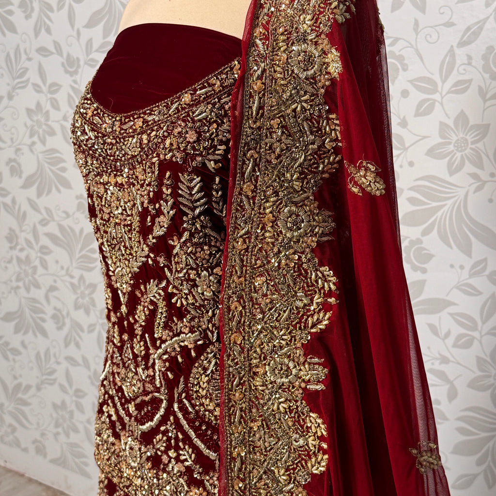 Bridal lehenga Pakistani BL032 shirt close up – kora jewelry hand work detail on deep anari red velvet fabric

