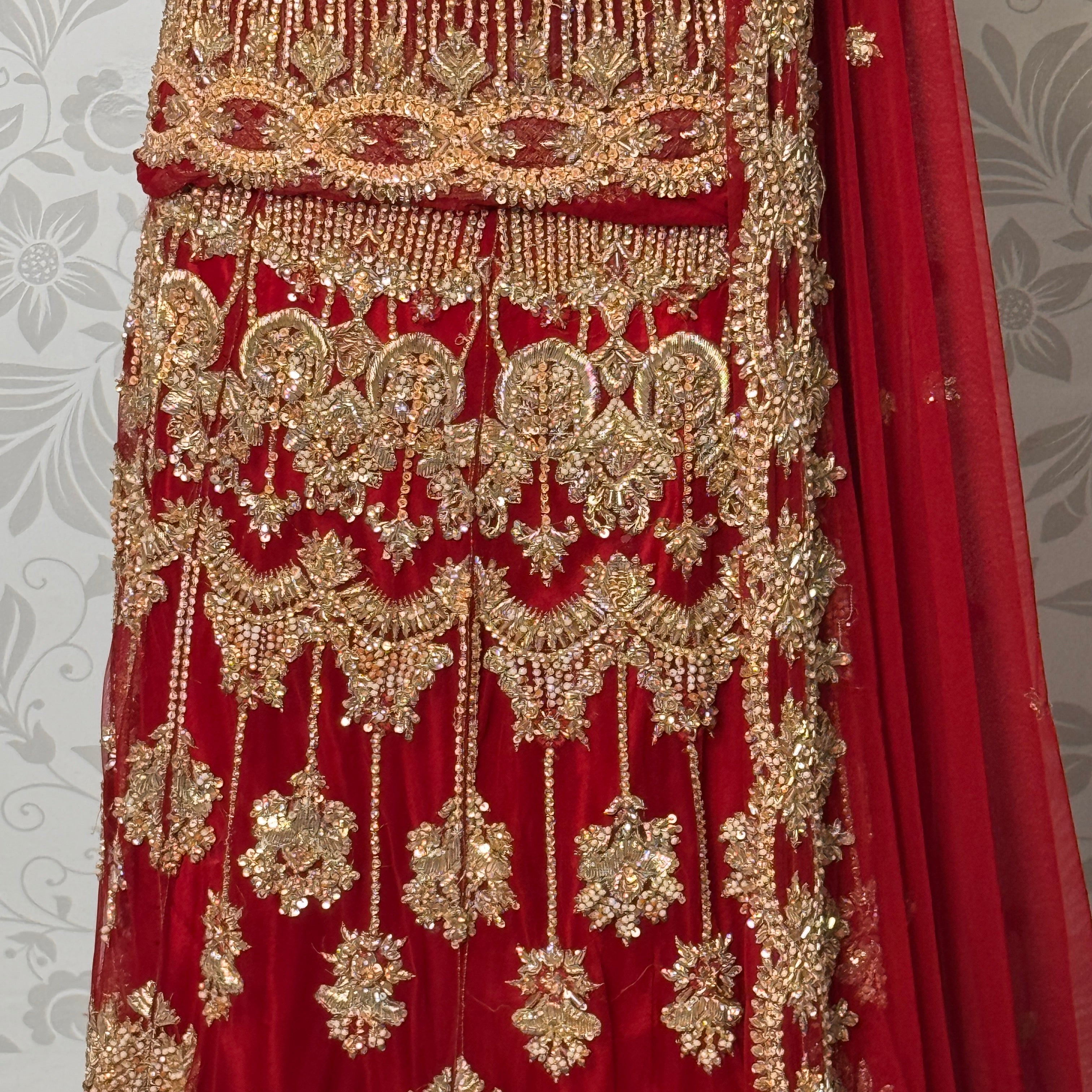 Wedding lehenga hand work BL033 lehenga front view – deep anari red velvet with dabka kora nakshi and jewelry embroidery full skirt Pakistan
