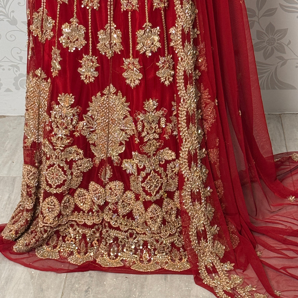 Wedding lehenga hand work BL033 lehenga front view – deep anari red velvet with dabka kora nakshi and jewelry embroidery full skirt Pakistan
