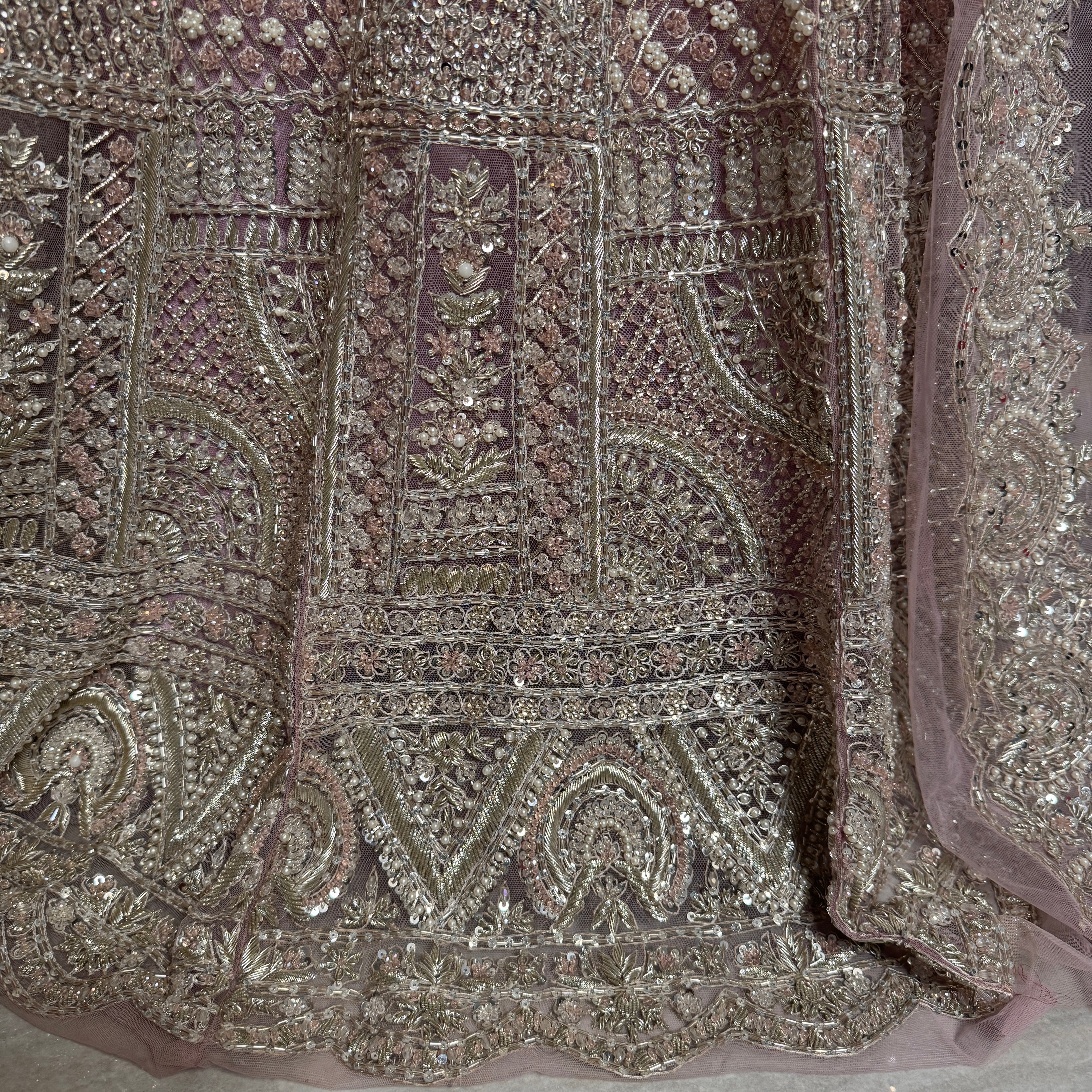 Bridal maxi for nikkah BM022 embroidery close up – dabka and jewelry hand work detail on baby pink net fabric
