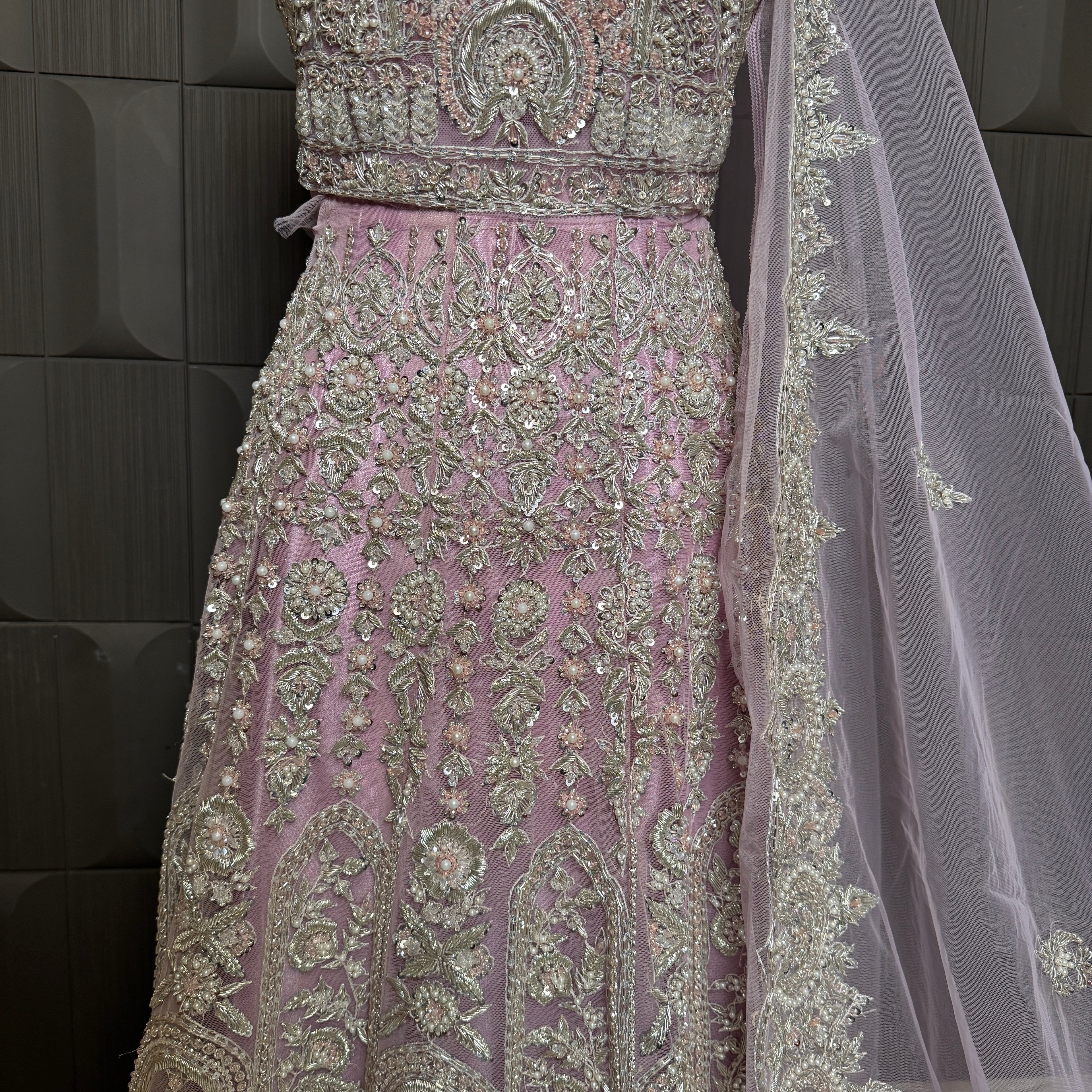 Bridal maxi for nikkah BM022 embroidery close up – dabka and jewelry hand work detail on baby pink net fabric
