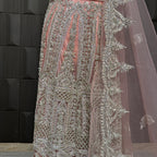 Bridal maxi for nikkah BM023 embroidery bottom close up – kora dabka sequins crystal hand work detail on light pink net fabric
