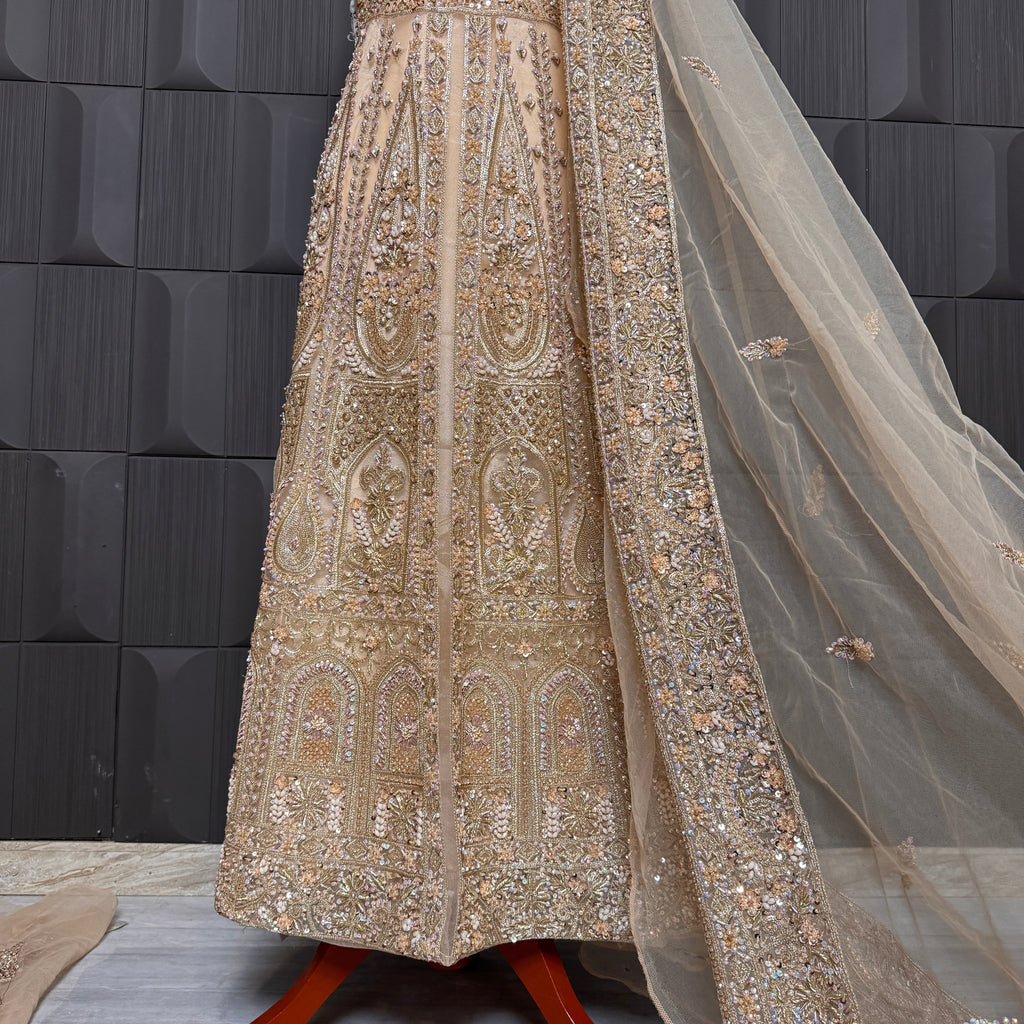 Bridal maxi for nikkah BM021 embroidery close up bottom – dabka and jewelry hand work detail on skin gold net fabric
