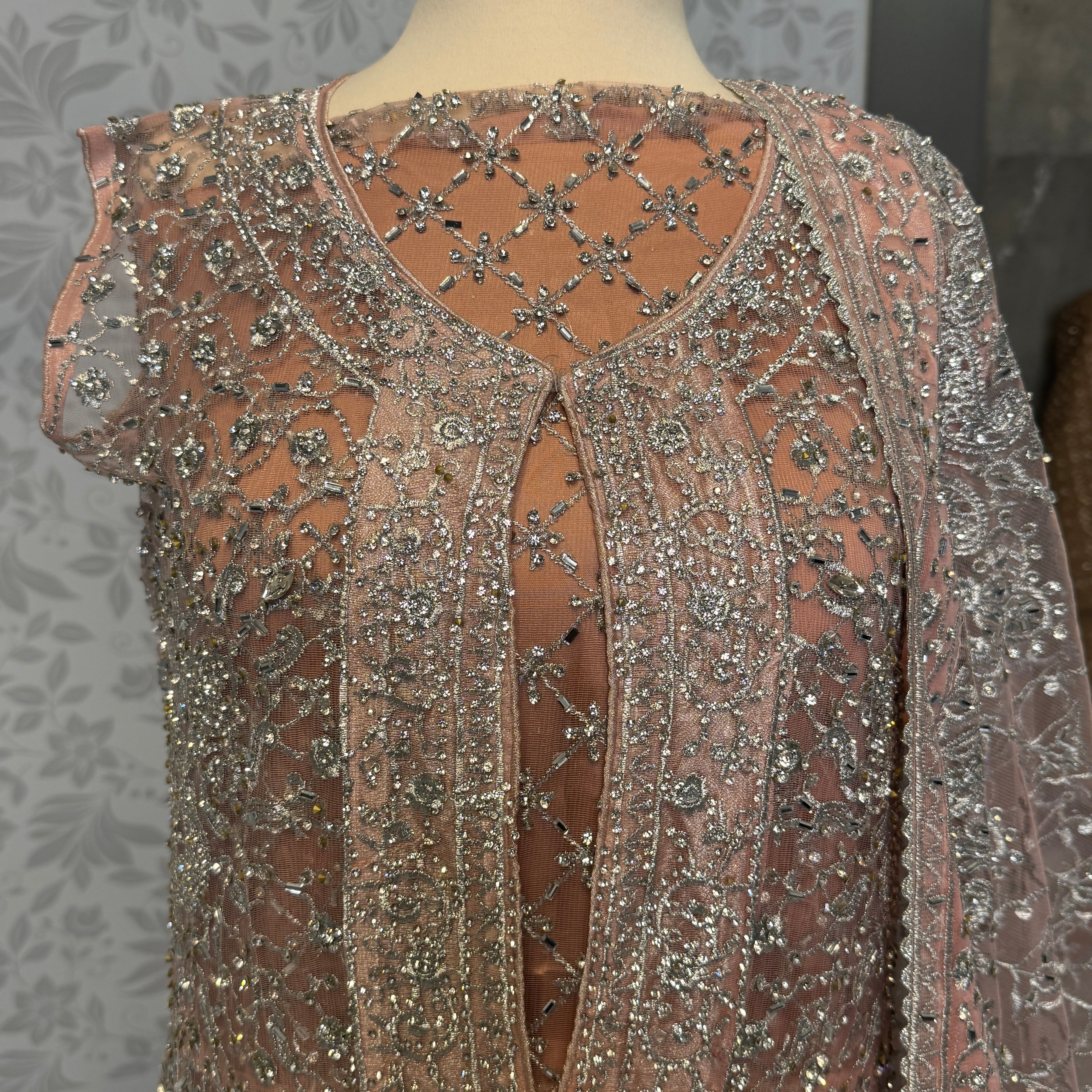Bridal maxi for barat BM020 maxi close up – machinary work detail on tea pink net fabric
