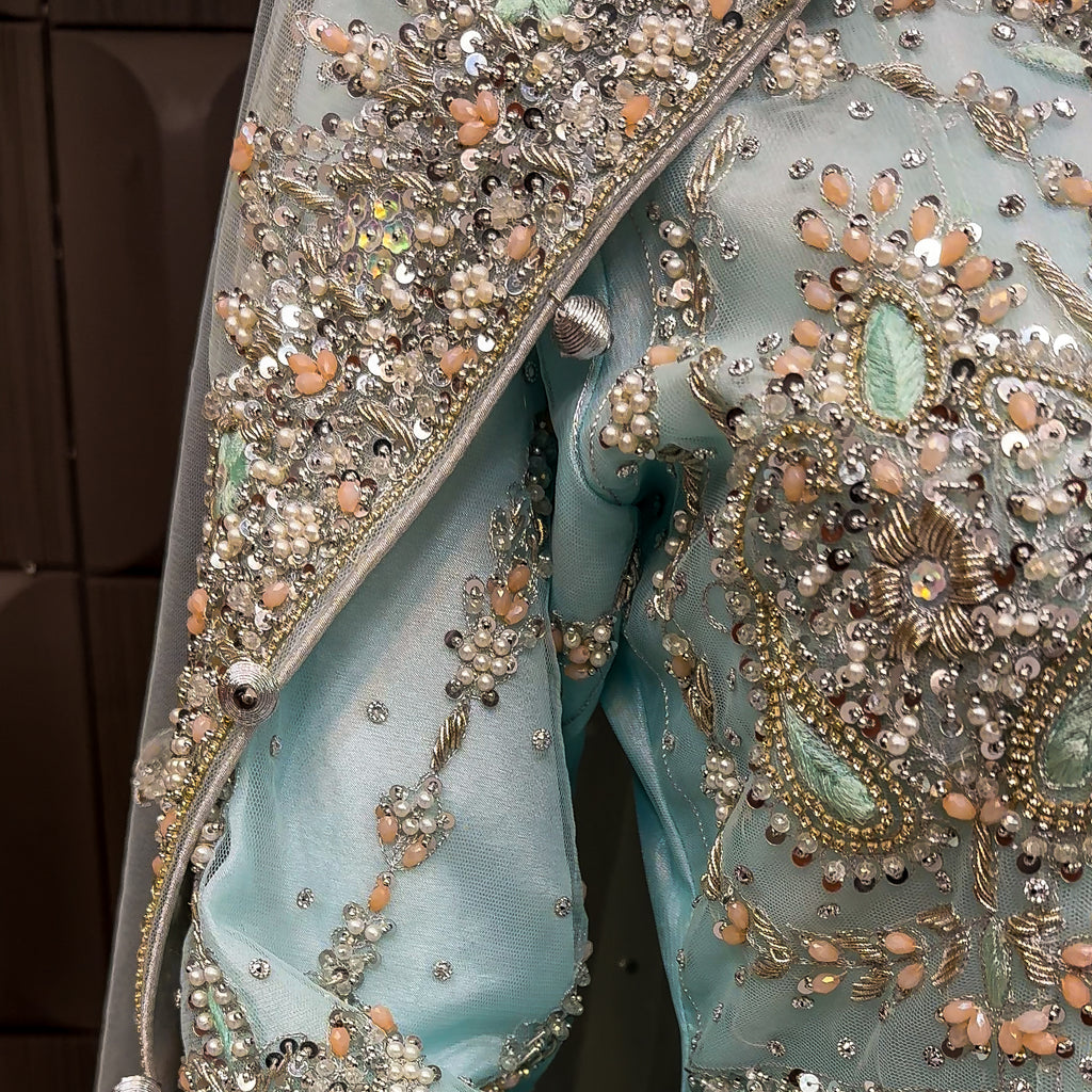 Pakistani bridal lehenga with heavy kora and crystal handwork sleeves