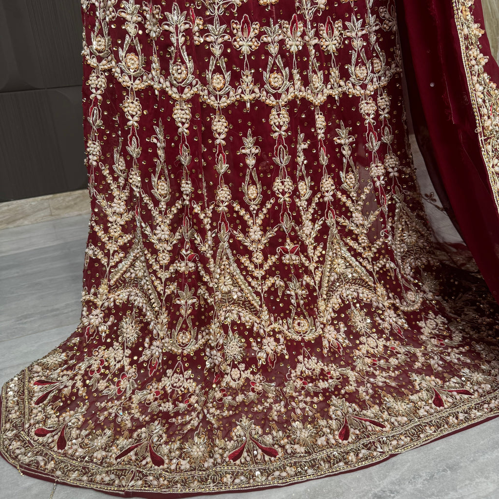 Bridal lehenga pakistani in deep red with tilla kora crystal and botti spray work