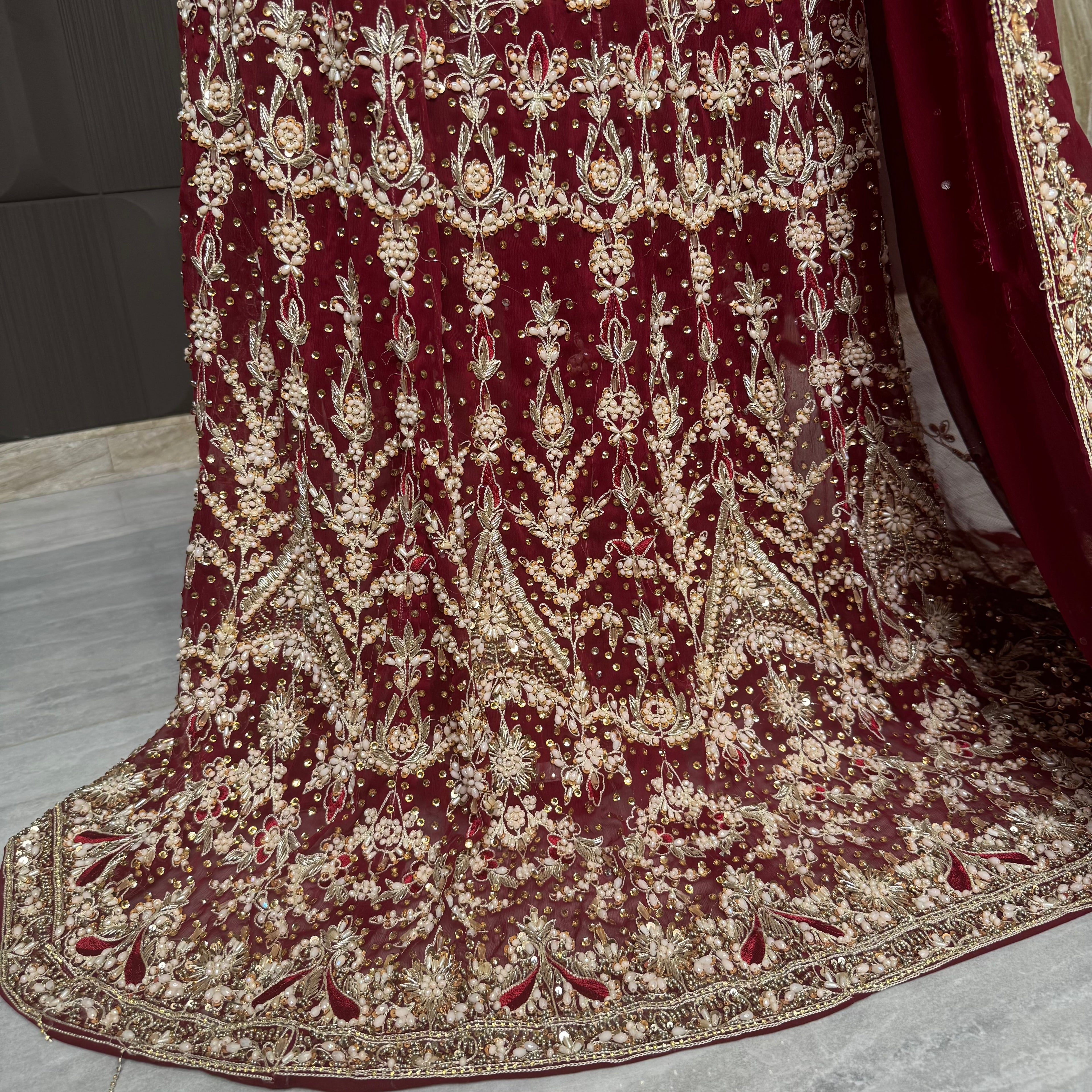 Bridal lehenga pakistani in deep red with tilla kora crystal and botti spray work
