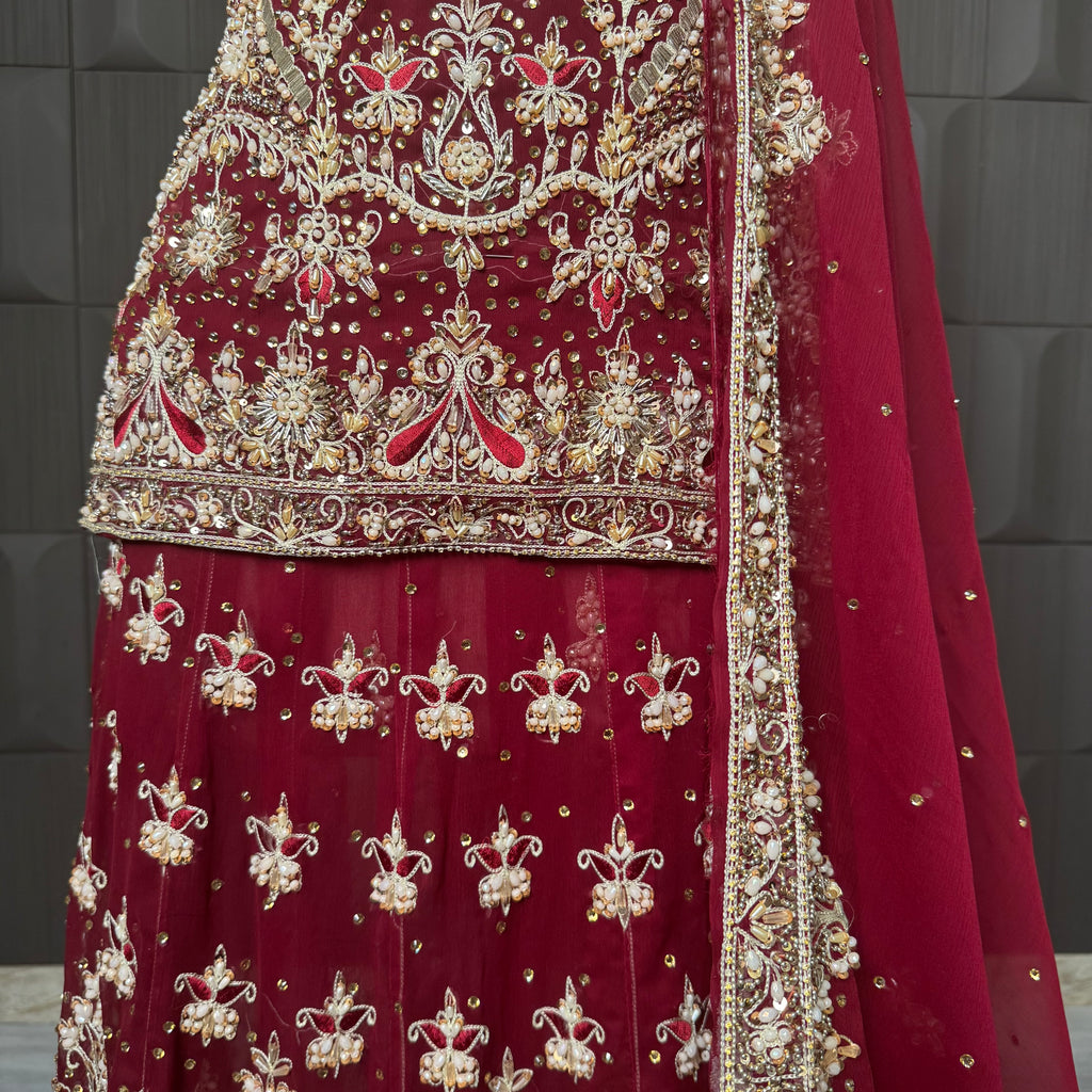 Bridal lehenga pakistani in deep red with tilla kora crystal and botti spray work PAKISTAN