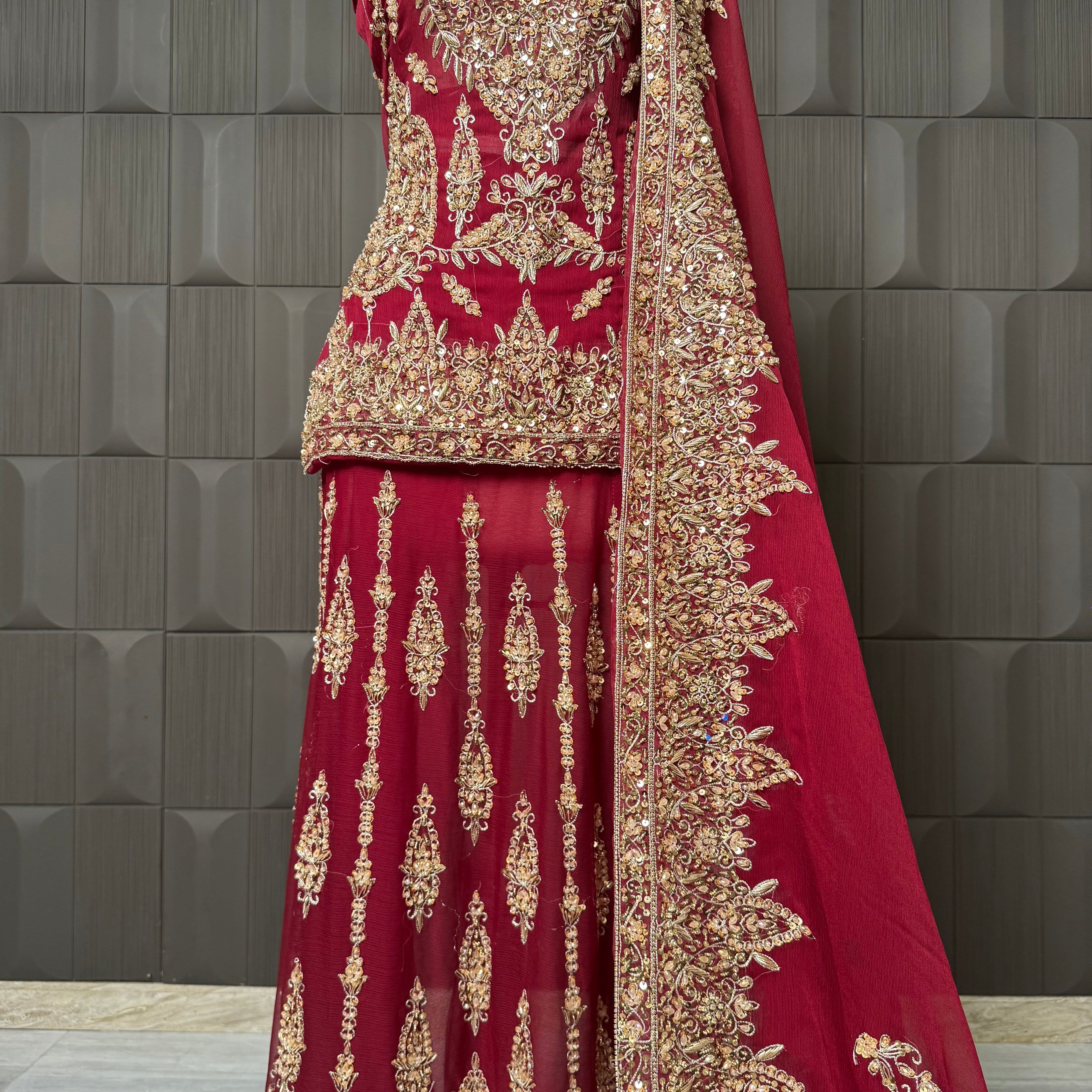 Bridal lehenga pakistani in deep red crinkle chiffon with tilla and kora hand work