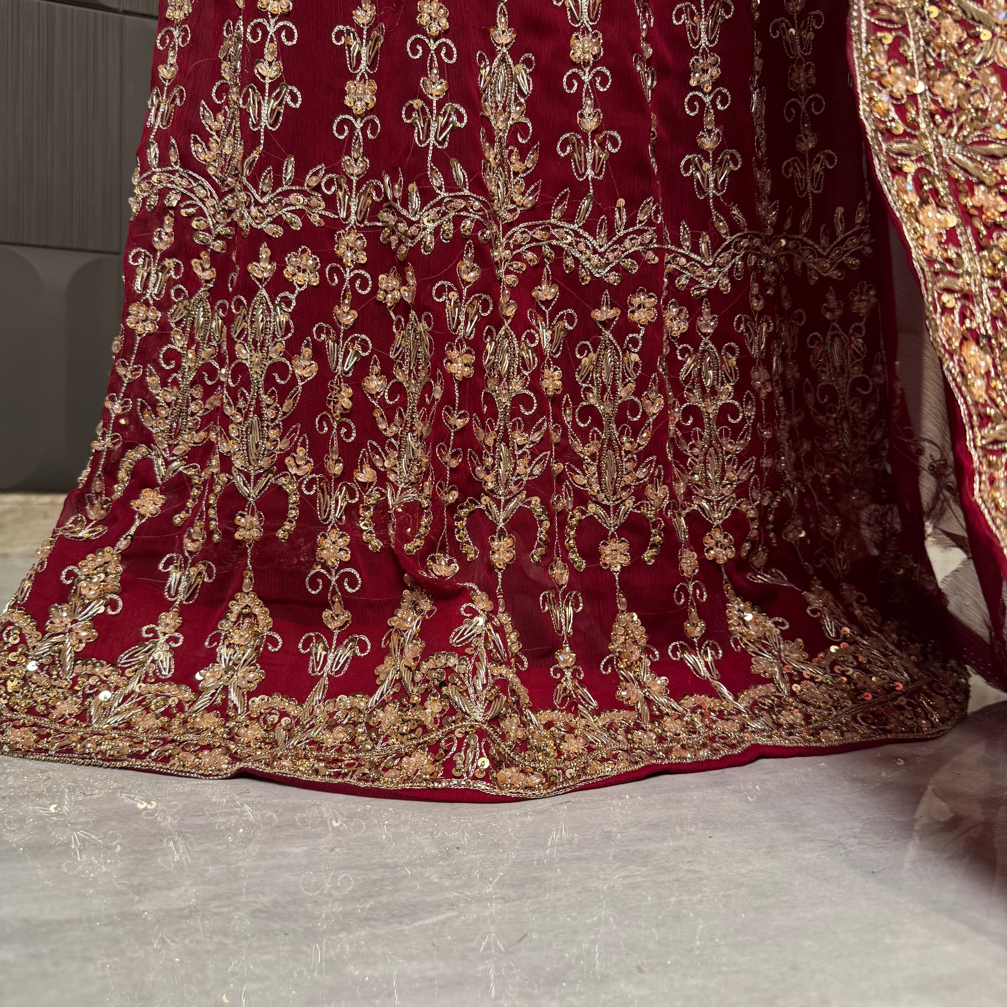 Bridal lehenga pakistani in deep red with tilla kora crystal and botti spray work