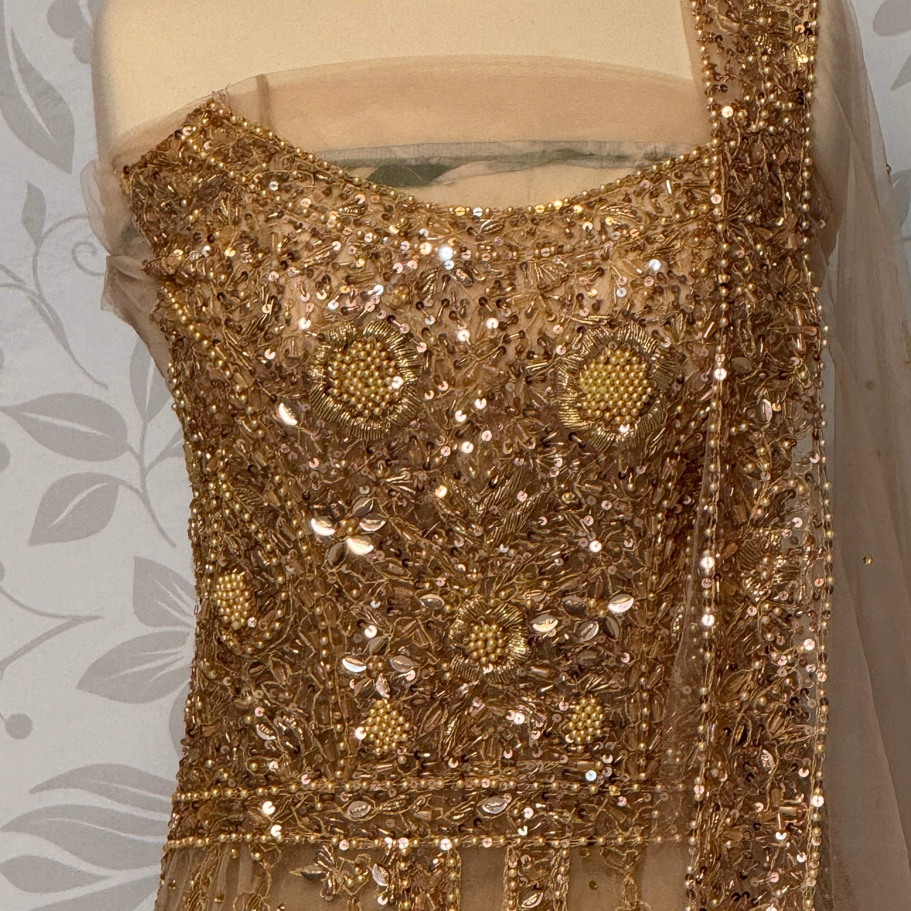 Bridal maxi for barat BM013 maxi close up – nakshi pearls crystal sequin hand work detail on skin gold net fabric
