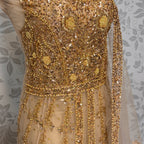 Bridal maxi for barat BM013 maxi close up – nakshi pearls crystal sequin hand work detail on skin gold net fabric
