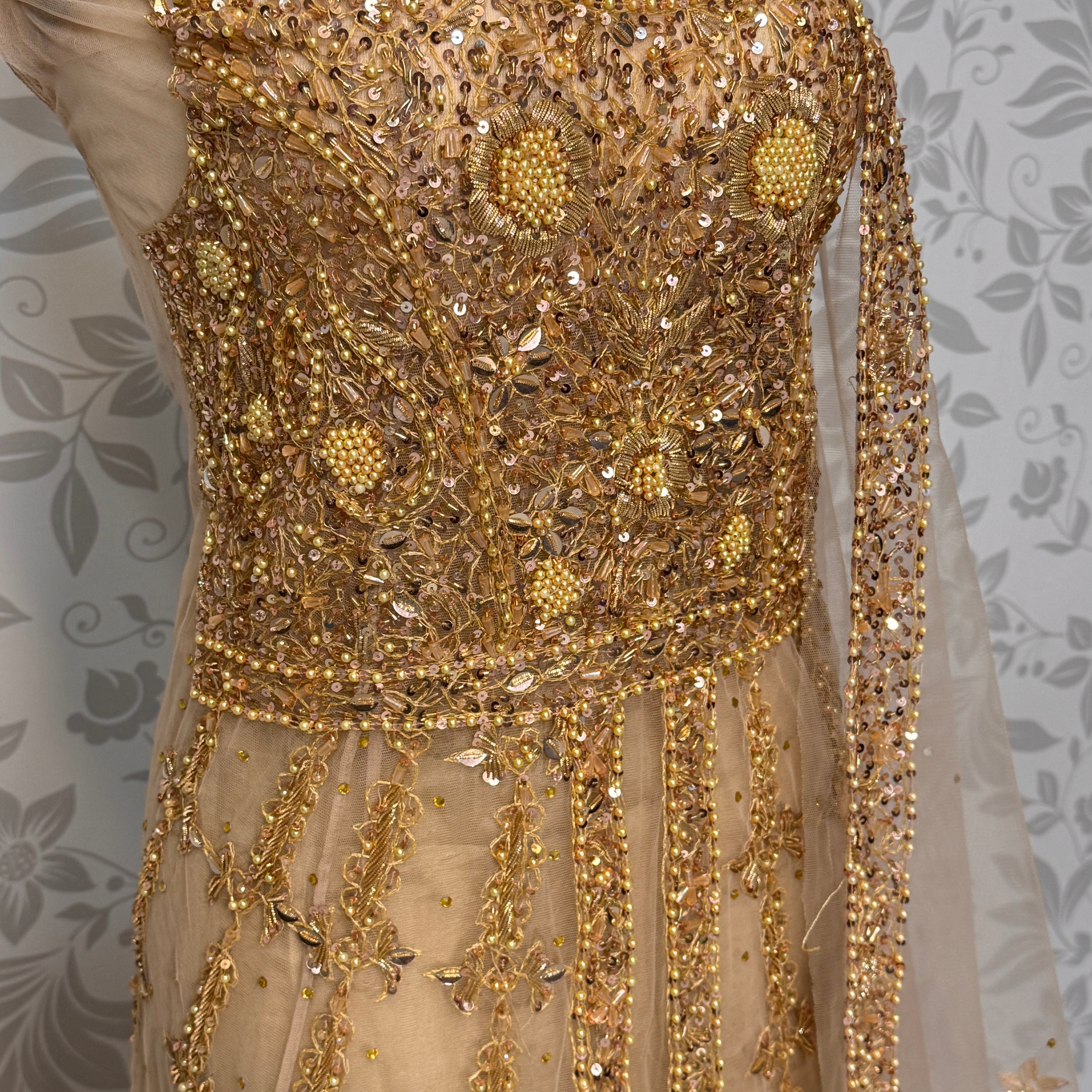 Bridal maxi for barat BM013 maxi close up – nakshi pearls crystal sequin hand work detail on skin gold net fabric
