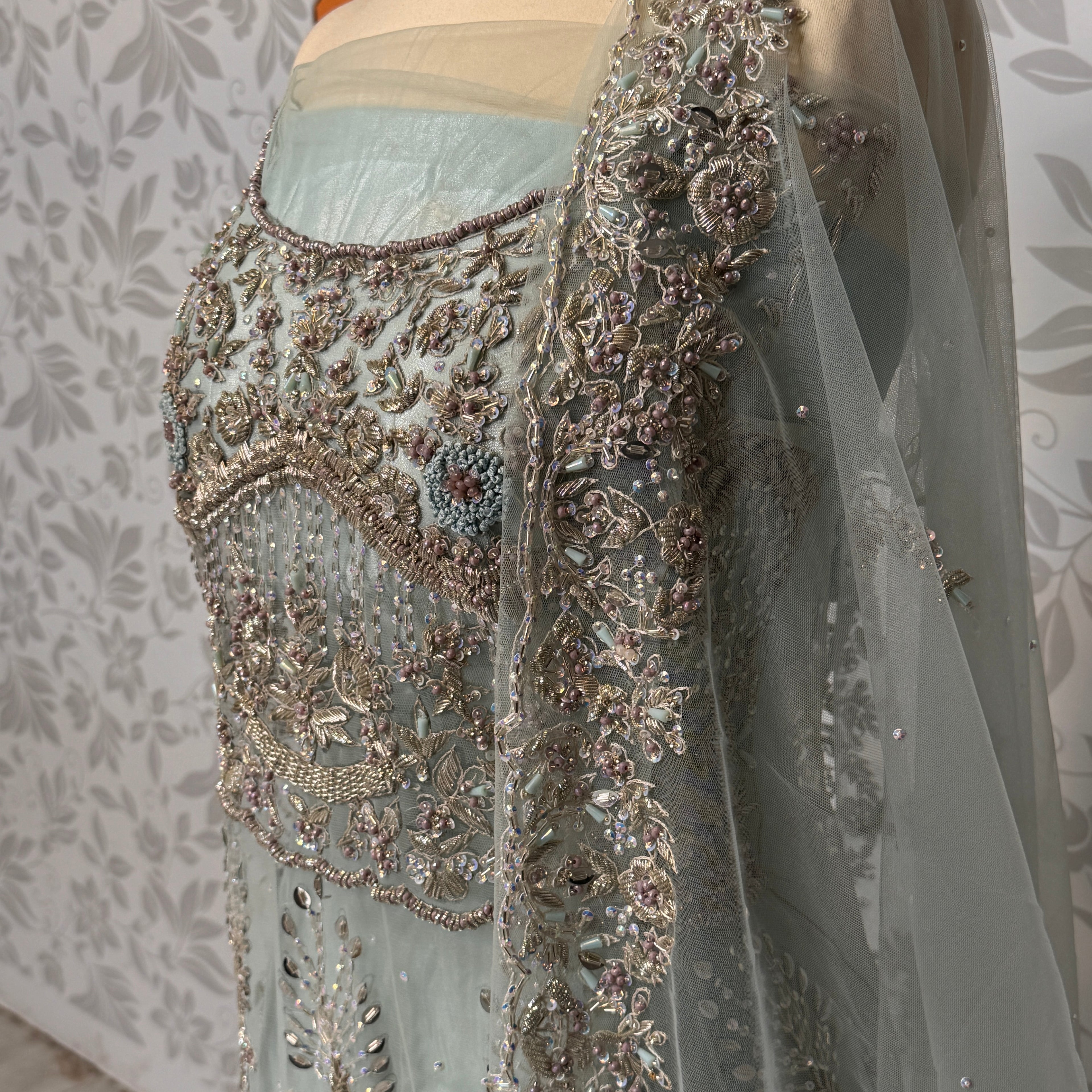 Bridal maxi for barat BM014 maxi front close up – kora nakshi pearls sequin hand work detail on ice blue net fabric
