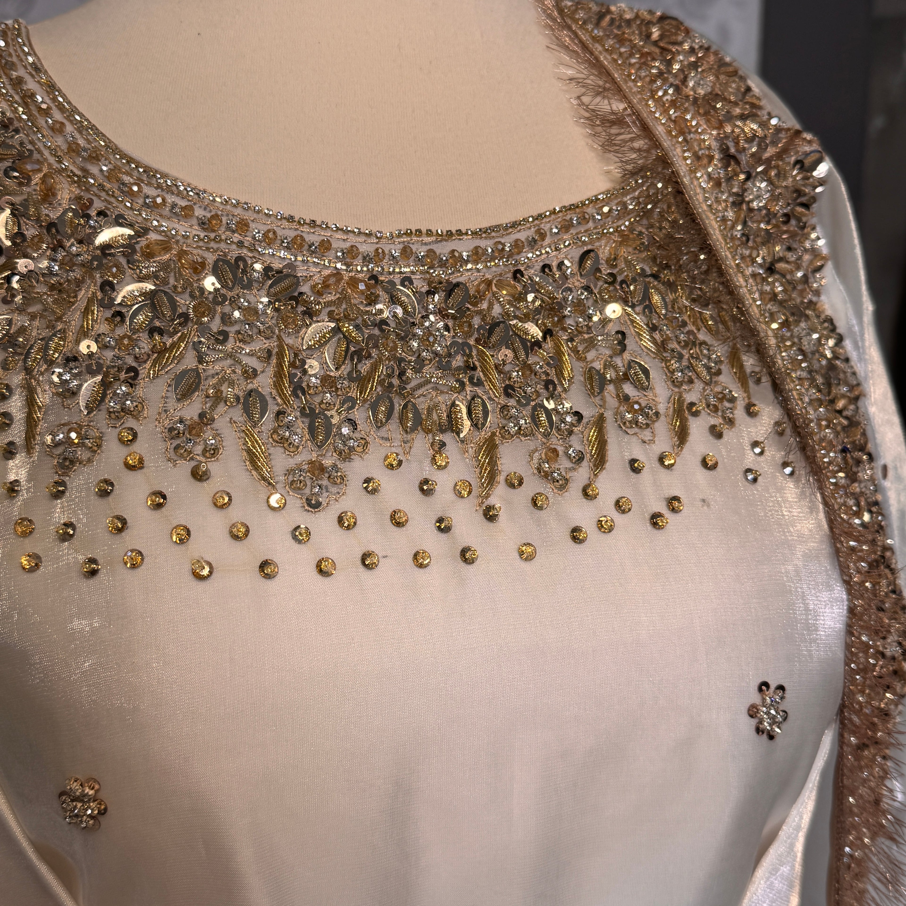 Party wear dresses for girl in Pakistan PW032 shirt close up – kora nakshi sequin hand work detail on off-white sheesha silk fabric
