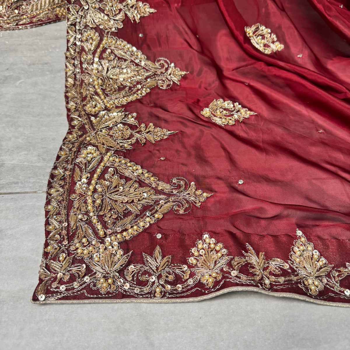 Bridal lehenga with price BL035 dupatta close up – heavy matha patti border hand embroidery deep Anari red tissue silk bridal lehenga Pakistani
