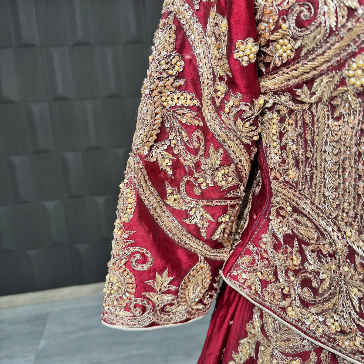 Bridal lehenga choli Pakistani BL035 sleeves view – heavy hand embroidery dabka nakshi crystals pearls deep Anari red tissue silk
