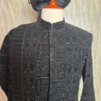 sherwani for groom black shirt close-up with cutdana embroidery machine work
