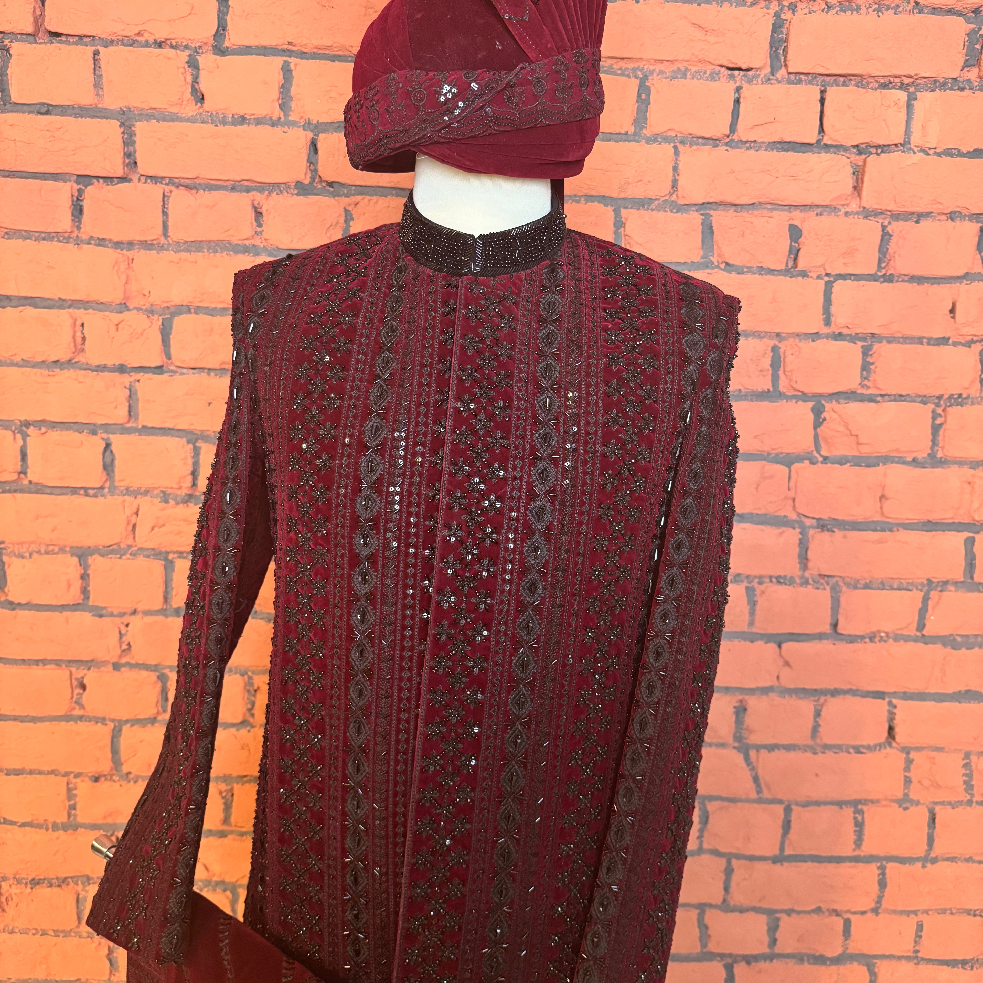 sherwani for groom maroon shirt close-up with cutdana embroidery machine work
