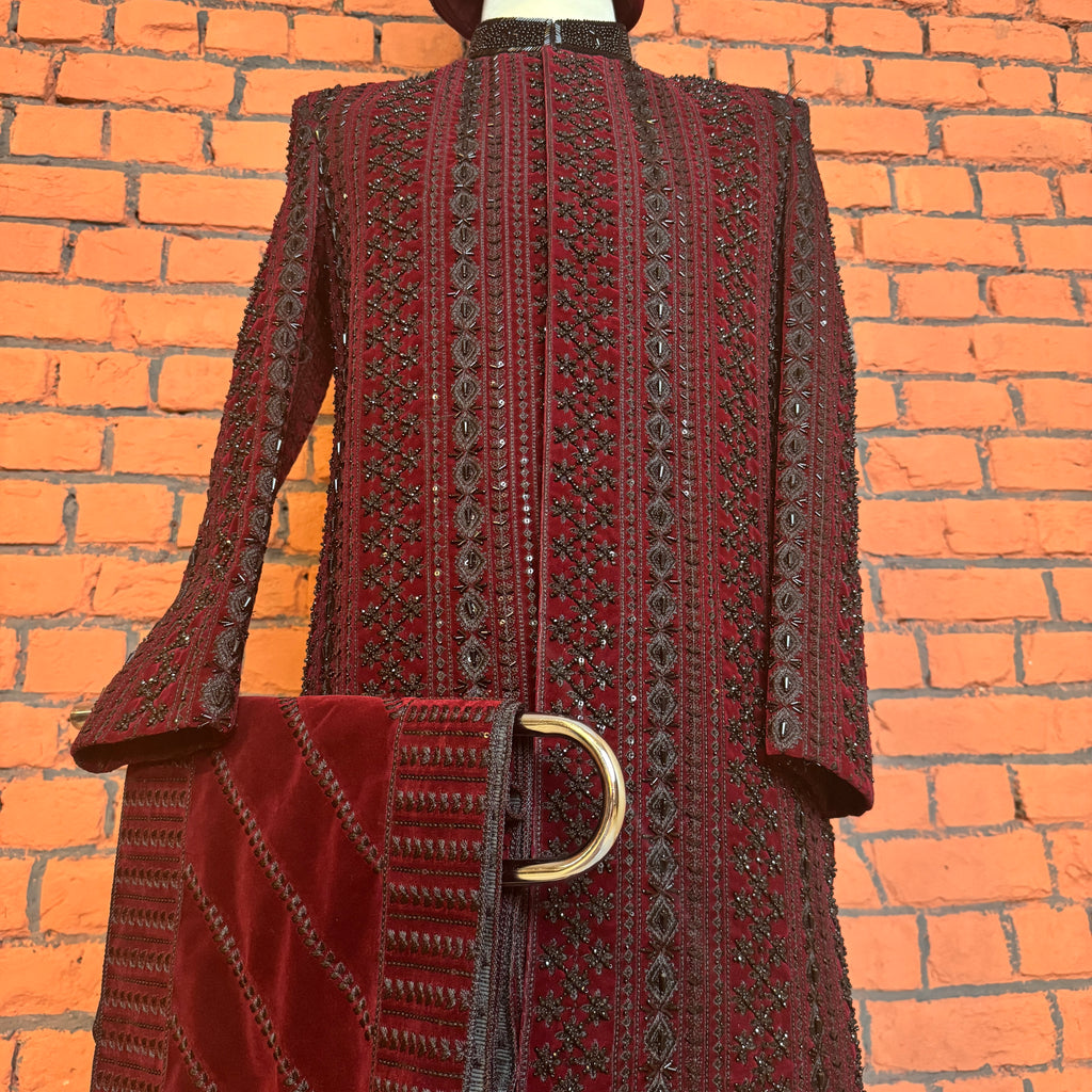 sherwani for men maroon fabric and embroidery texture close-up
