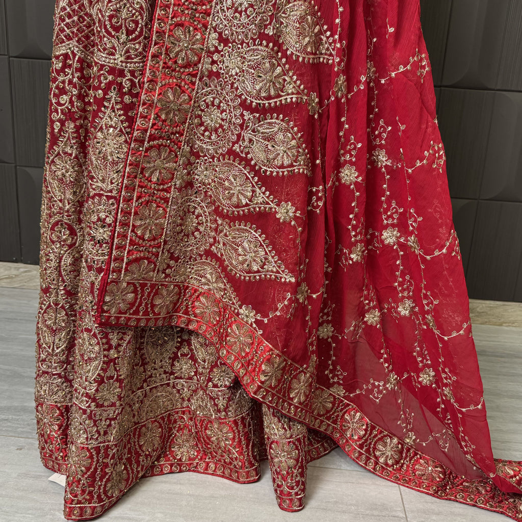 Indian bridal lehenga designs with machine tilla and stone work in deep red