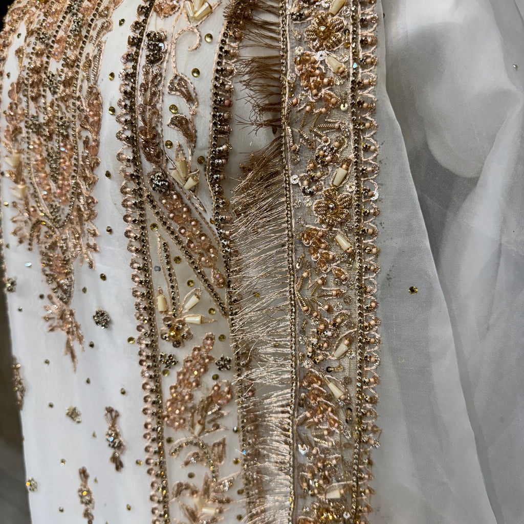 Party wear dresses pakistani brands PW039 shirt front close up – hand embroidery work on white organza tissue Pakistan
