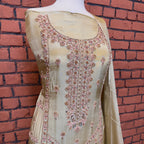 Party wear dresses for girl in Pakistan PW034 shirt close up – kora dabka hand work detail on skin gold tassel silk fabric
