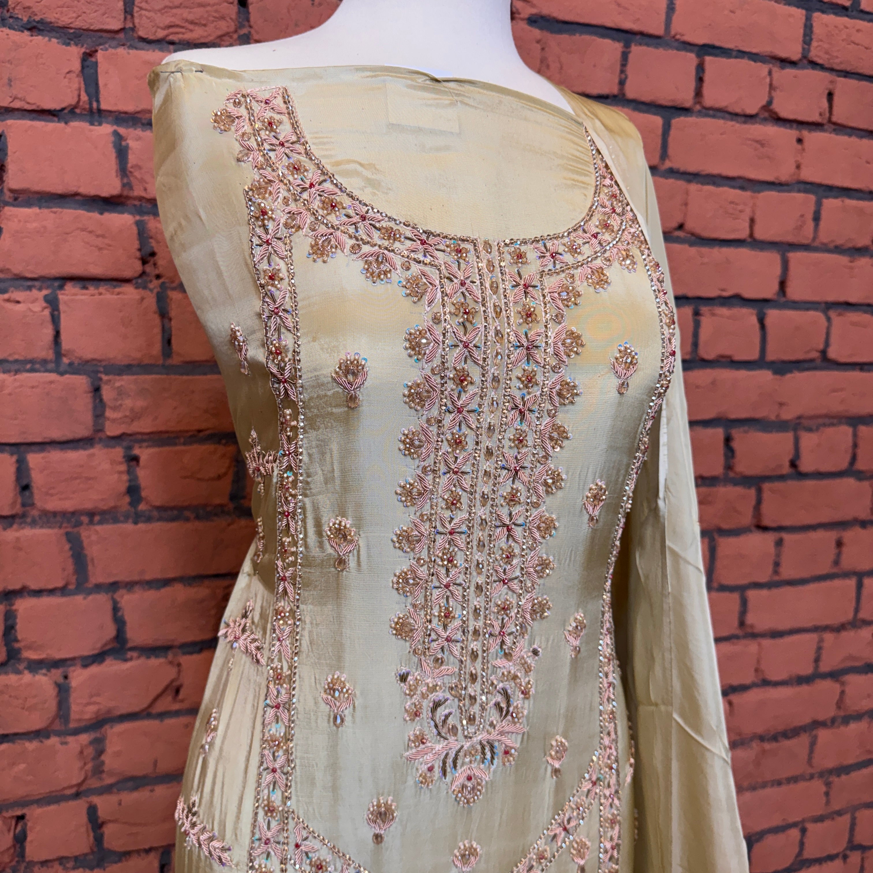 Party wear dresses for girl in Pakistan PW034 shirt close up – kora dabka hand work detail on skin gold tassel silk fabric
