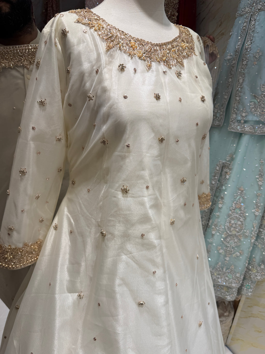 Close-up of nakshi crystal cutdana sequin handwork on off-white nikah dress for bride Pakistani – PW042

