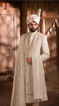sherwani for men 5pcs set in cream Raw silk with cutdana embroidery by The Akbar Mall
