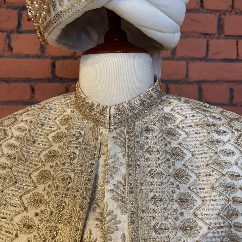 sherwani for groom cream shirt close-up with cutdana embroidery machine work
