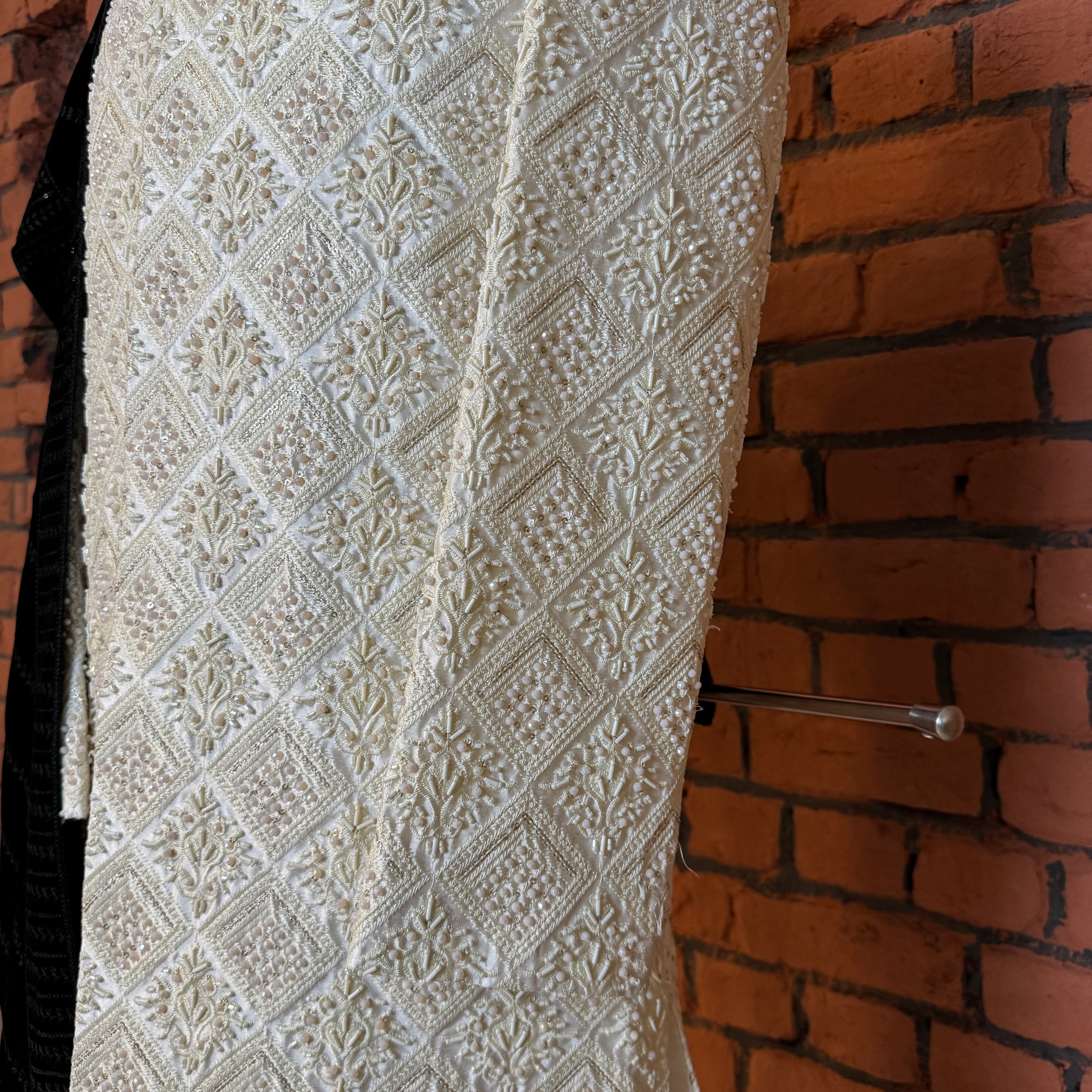 sherwani for men off white sequins and crystal embroidery close-up
