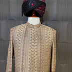 sherwani for groom skin gold shirt close-up with cutdana embroidery machine work

